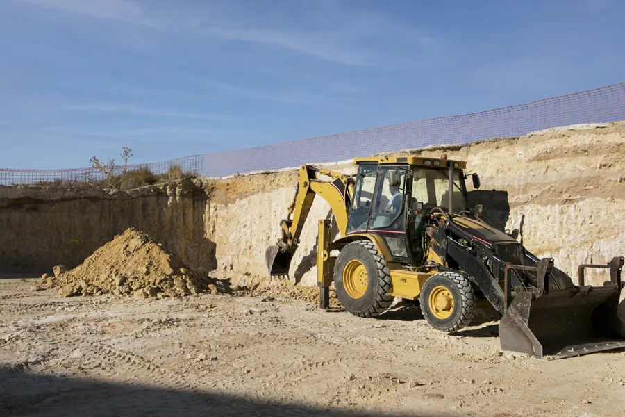 Excavation equipment performing large-scale site preparation and grading.